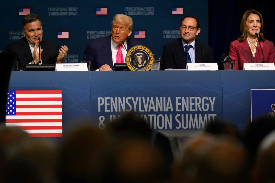 US President Donald Trump (second left) speaks to guests and investors at the inaugural Pennsylvania Energy and Innovation Summit in Pittsburgh, Pennsylvania, July 15, 2025.