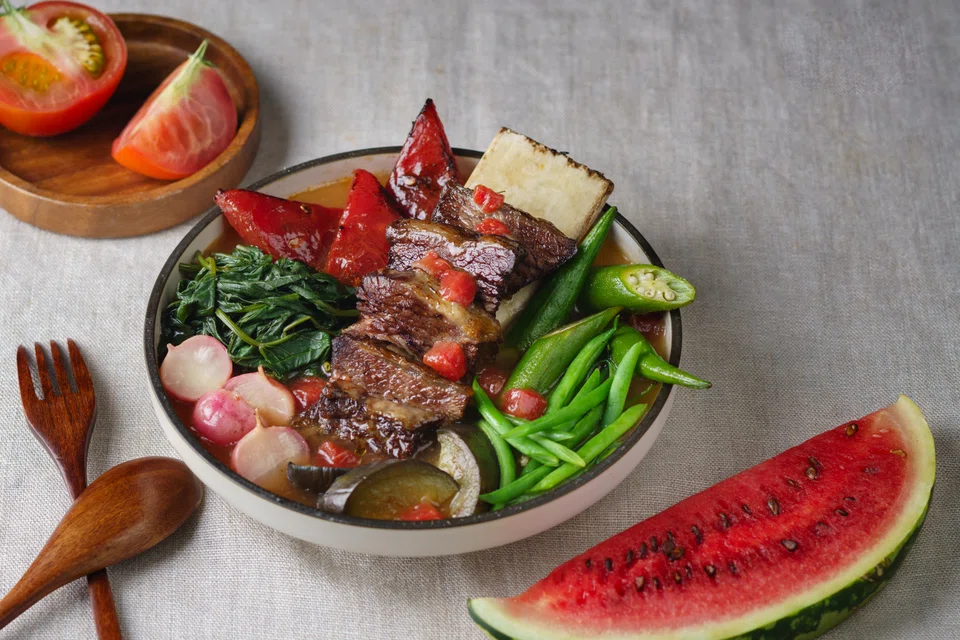 Sinigang is a savoury-sour tamarind broth with wagyu short rib and watermelon.