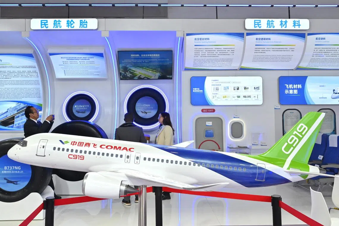 A model of Comac's C919 plane on display at the second China International Supply Chain Expo in Beijing on Nov 28, 2024. 
