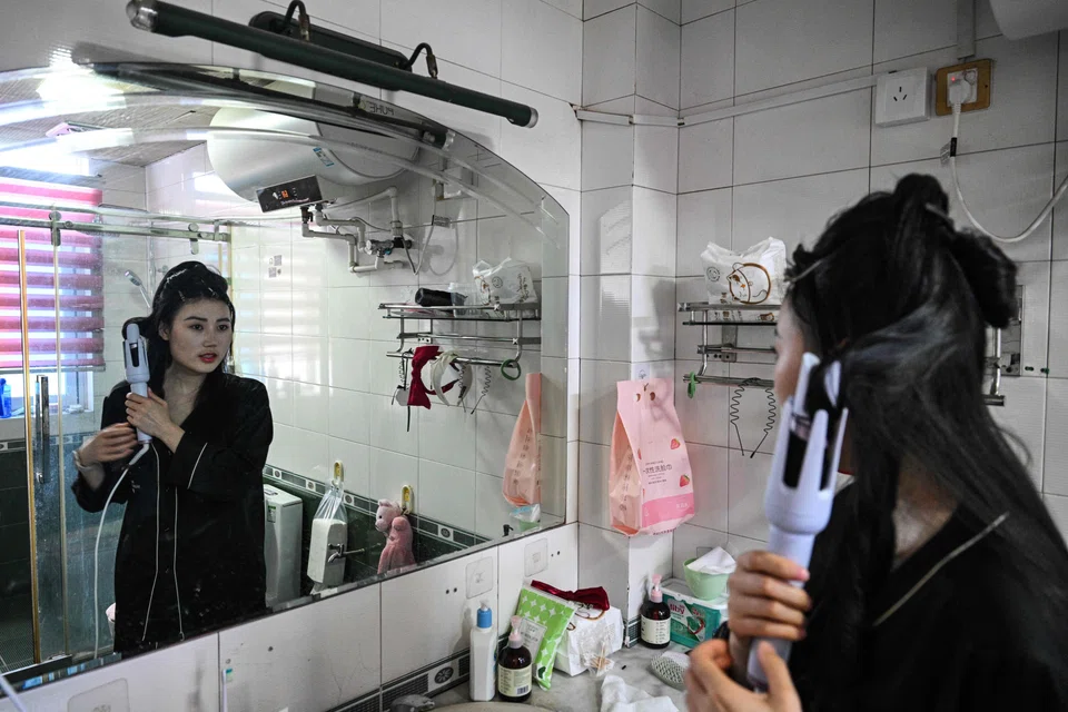 Actress Guo Ting gets ready for an audition in Hengdian, Zhejiang, China, June 18, 2024. Guo is part of a trend of young Chinese giving up the traditional aspiration of a stable, mainstream job in exchange for alternative careers and a chance at self-fulfillment.