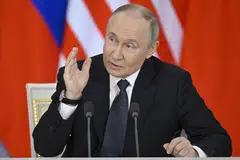 After days of declining to say if Russian President Vladimir Putin would go, the Kremlin named its negotiating team late on Wednesday.