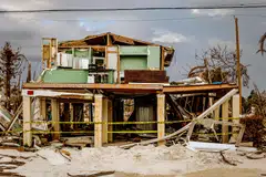 Extreme weather has driven up insurance costs nationwide. Recent research has found that those rising costs can drive homeowners into delinquency, even if the house avoids damage.