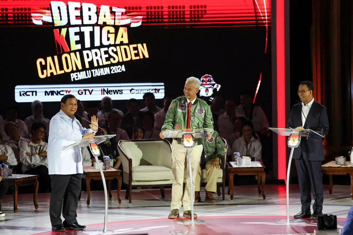 (From left) Prabowo Subianto, Ganjar Pranowo and Anies Baswedan during the nationally televised presidential debate on Sunday. The candidates discussed defence, geopolitics and diplomacy, among other topics.