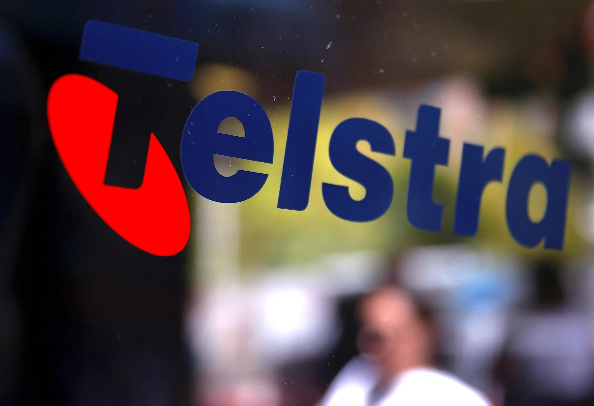 Telstra logs higher annual profit, announces A billion buyback