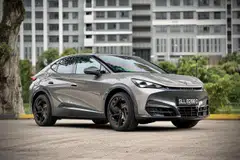 The Cupra Tavascan is a dramatic, brooding machine with sculpted haunches and a glowing crest.


 