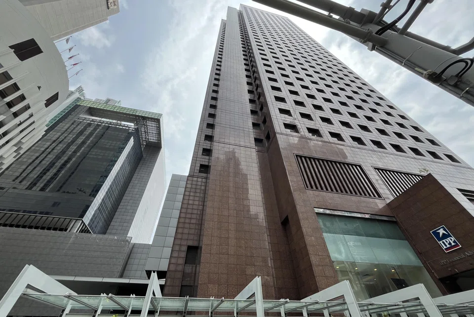 78 Shenton Way's Tower 1 (right) is a 34-storey granite-clad building completed in 1988. The 11-storey glass-clad Tower 2 beside it was completed in 2009.