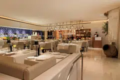 estiatorio Milos's spacious, marble filled interiors.