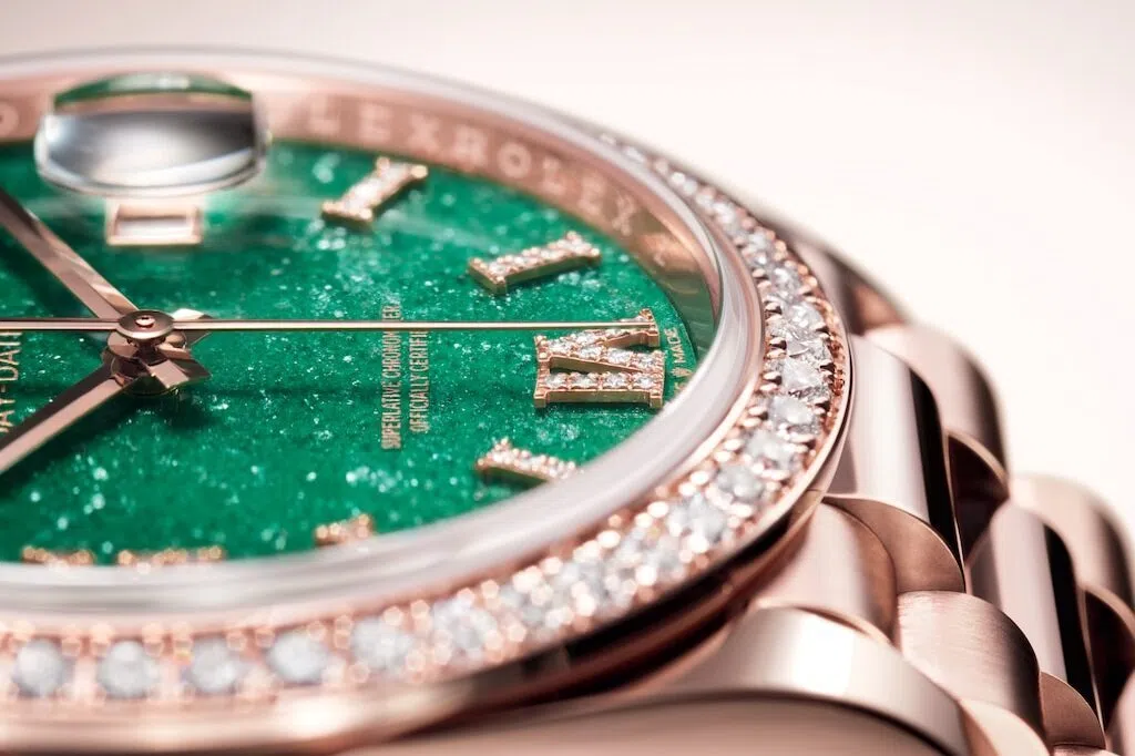 Oyster Perpetual Day-Date 36 Is presented with a dial in green aventurine, a stone with a finely crystallised surface.