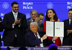 US President Donald Trump holds a signed Charter of the Board of Peace, as he takes part in a charter announcement for his Board of Peace initiative, on Jan 22.