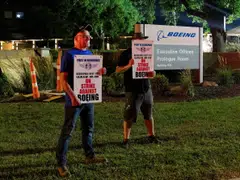 Workers protest during a walkout by members of the International Association of Machinists and Aerospace Workers (IAM) over contract negotiations, outside Boeing company's facility, Berkeley, Missouri, Aug 4, 2025. 