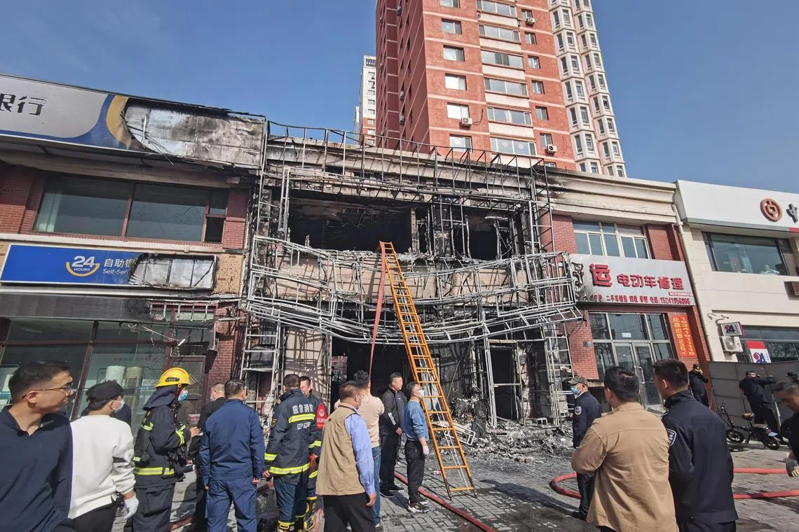 Emergency services at the site of a restaurant fire in Liaoyang, northeast China's Liaoning Province, April 29, 2025. At least 22 people were killed in the incident, according to Xinhua news agency.  
