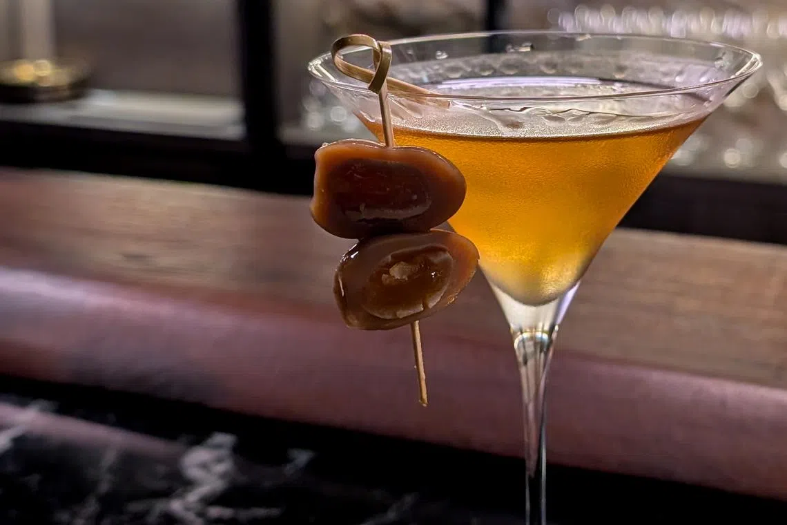 Kill Me Softly is a Japanese twist on a classic dirty martini, topped with a marinated quail egg.