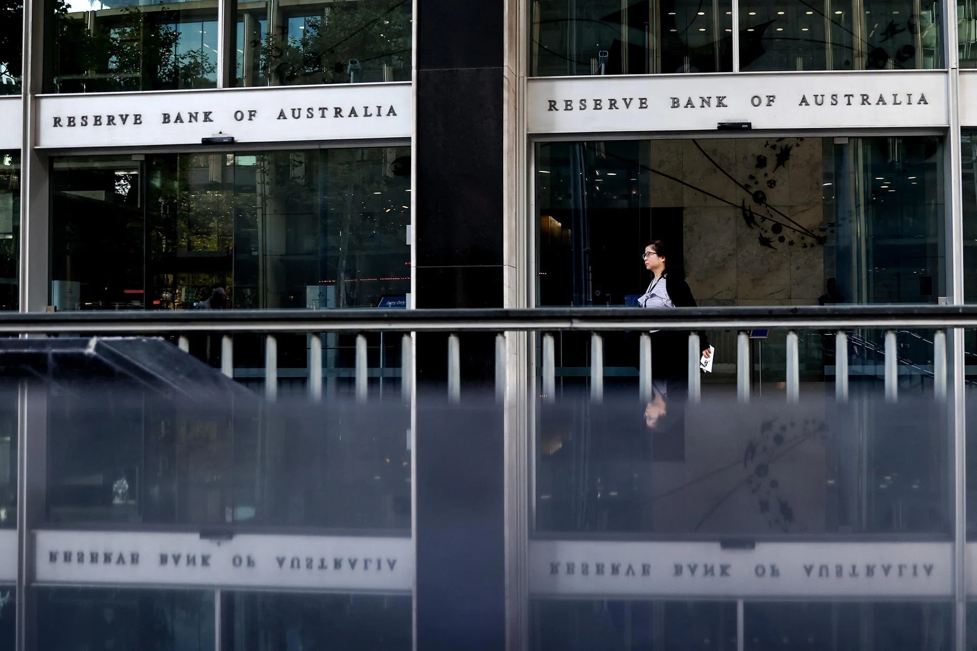 Australia’s central bank warns rate hikes might not be over after holding fire