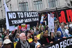Anti-Trump protesters take part in a march during a demonstration against US President Donald Trump in central London, Britain, Sep 17, 2025. 