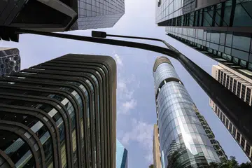 The Monetary Authority of Singapore tightens monetary policy on Tuesday and raised its inflation forecasts.