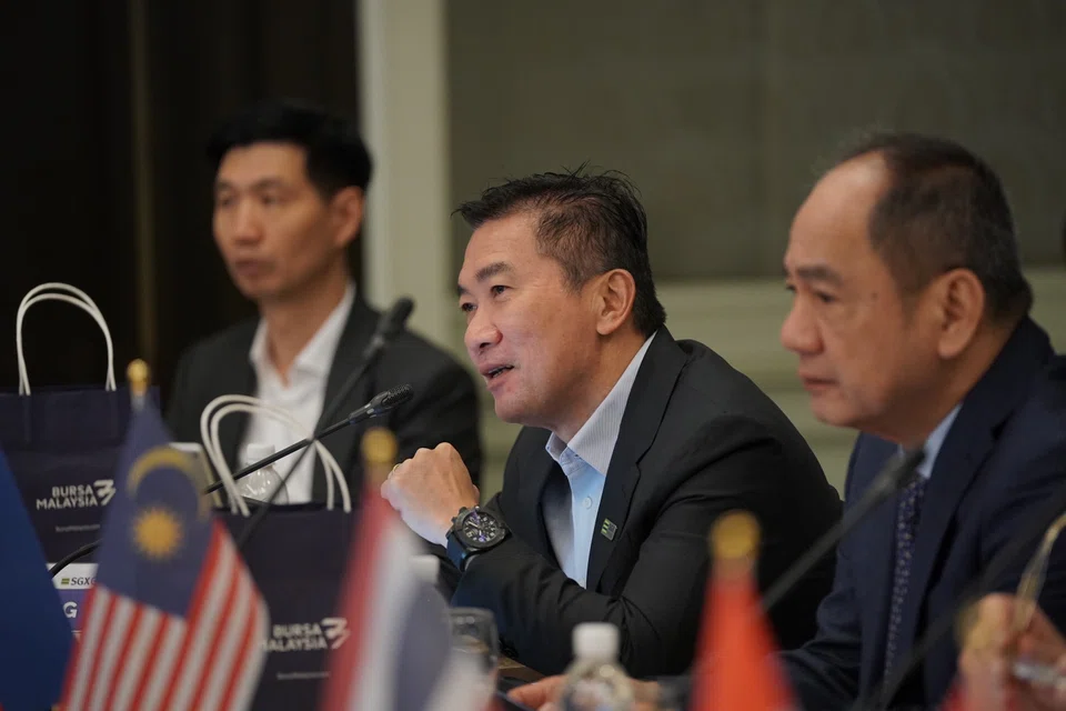 From left: Ng Yao Loong, CFO of Singapore Exchange; Loh Boon Chye, CEO of Singapore Exchange; and Ramon Monzon, president and CEO of the Philippine Stock Exchange, attending the 37th Asean Exchanges CEOs Meeting.