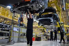 Companies in the electric vehicle sector have expanded aggressively, driving down prices and squeezing margins. Chinese capacity accounted for 105% of the global demand for EVs in 2024.