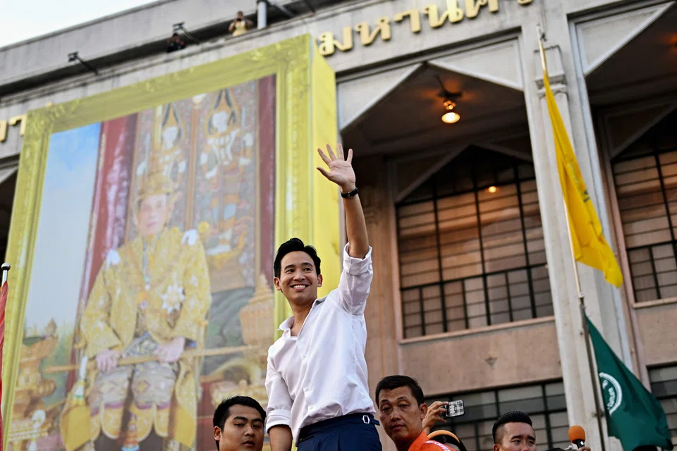 Move Forward Party leader and prime ministerial candidate Pita Limjaroenrat waves to supporters during a victory parade in Bangkok on May 15, 2023. 