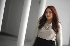 Former Workers' Party MP Raeesah Khan leaving the State Courts at the end of the day on Oct 16.