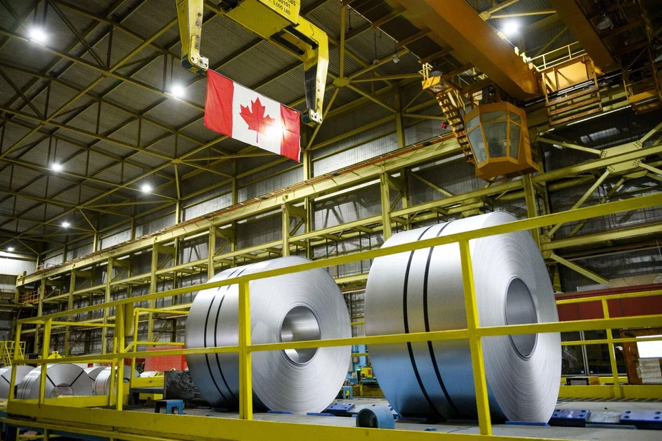 Spools of steel at an ArcelorMittal Dofasco facility in Hamilton, Ontario, Canada, March 12, 2025. Canada will keep its trade retaliation in place until the US lifts its own tariffs and commits to free trade, said Mark Carney, who will succeed Justin Trudeau as Canada’s prime minister. 