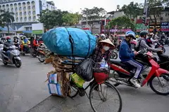 One reason for Vietnam’s success is that it has successfully balanced ties between the US and China, the world’s biggest economies. 