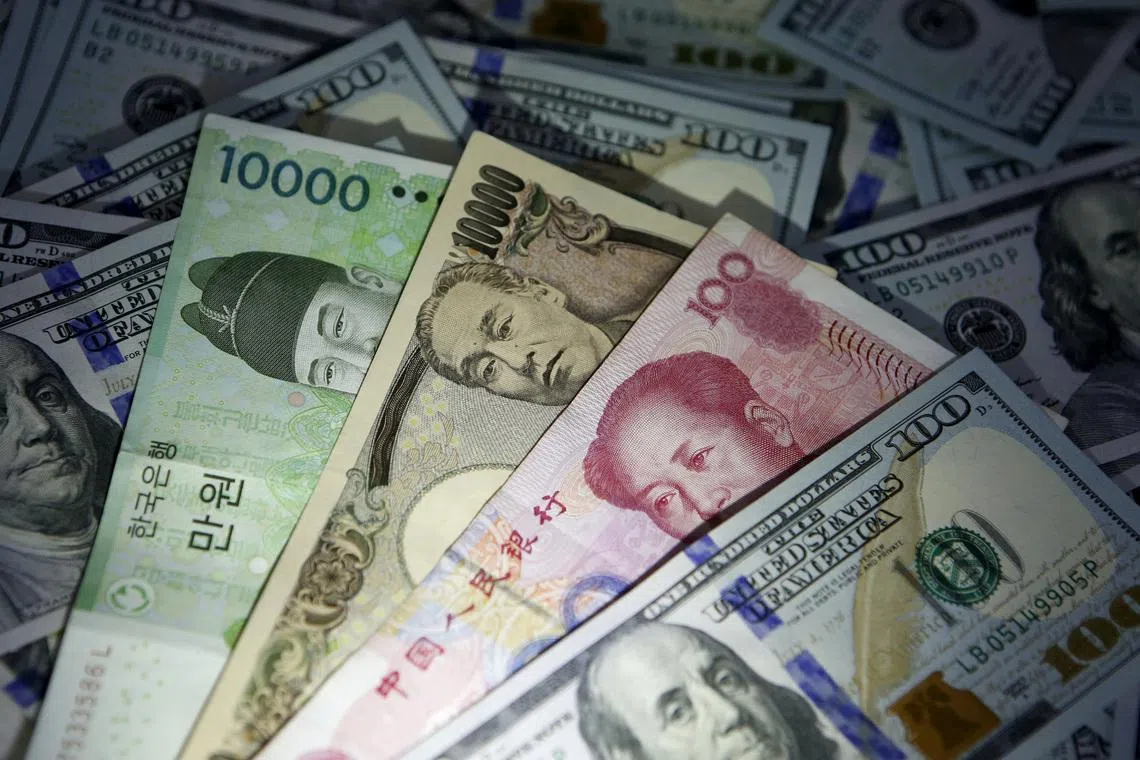 Several Asian currencies have weakened against the US dollar over the past month.