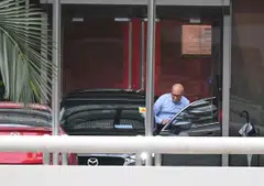 Then-transport minister S Iswaran leaving the Corrupt Practices Investigation Bureau following 10 hours of questioning on Jul 18, 2023.