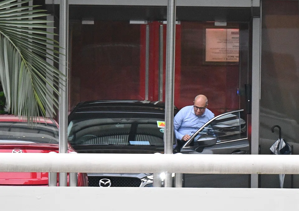 Then-transport minister S Iswaran leaving the Corrupt Practices Investigation Bureau following 10 hours of questioning on Jul 18, 2023.