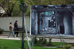 An image depicting war damage on display in a park in Teheran on Apr 21.