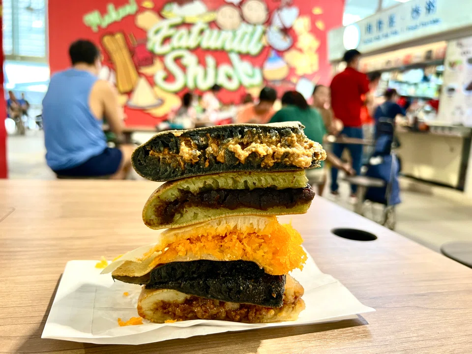 Munchi Pancakes, which sells min jiang kueh, is offering S$2,669 for stall assistants, up from S$2,200 previously.