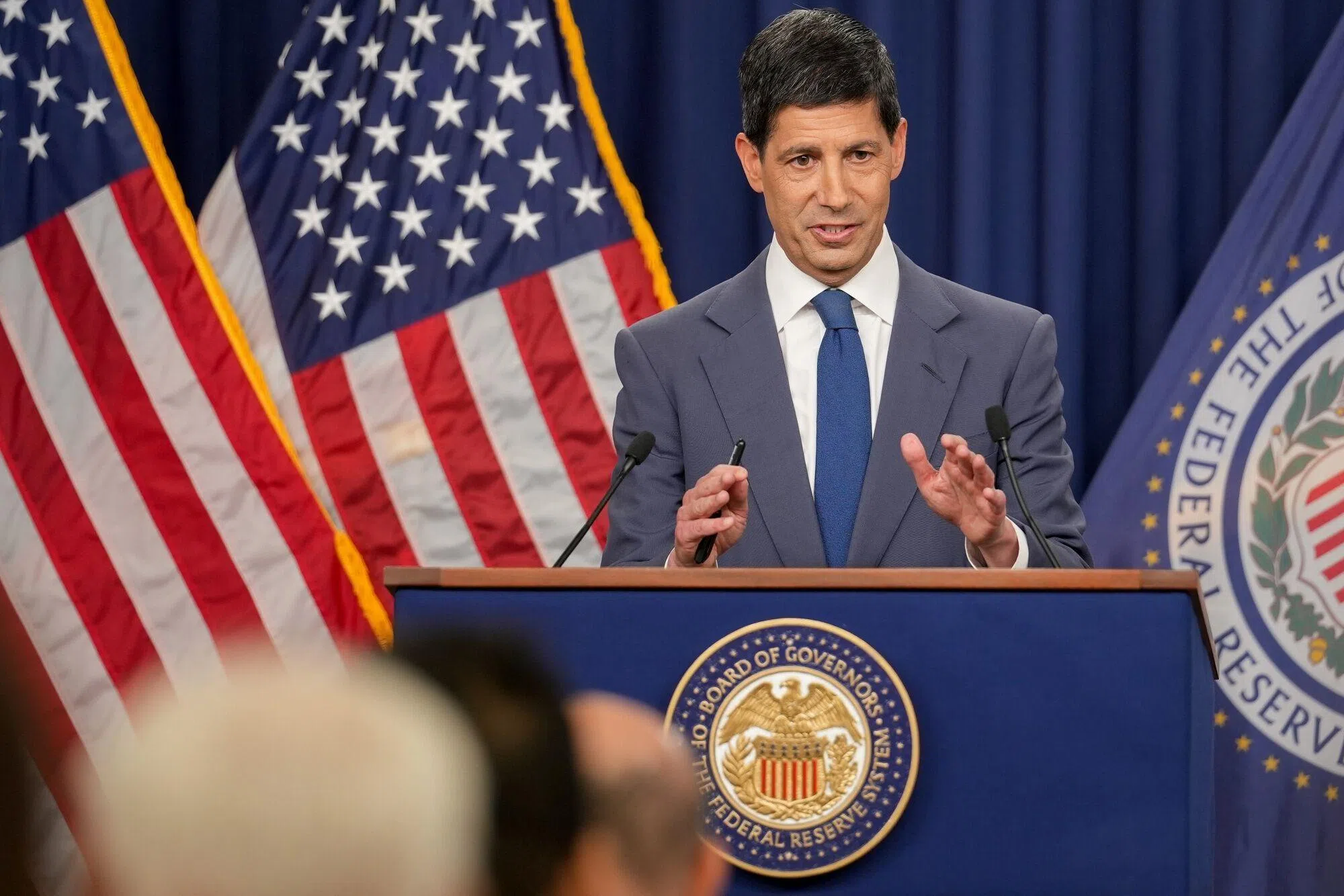 Divided US Fed leaves rates unchanged as Warsh vows not to ‘waver’ on inflation
