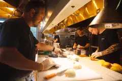 Dominic Piperno (left), the chef and owner of Hearthside,  with his team at his restaurant in Collingswood, New Jesery. Hearthside is one of a few US restaurants shifting to a four-day work week in order to better enrich the lives of its employees.