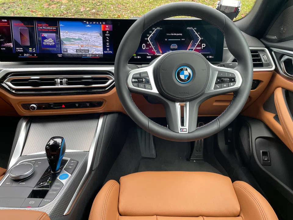 The BMW i4 M50 does have some vestigial features from the combustion era, such as a gear lever, even though it doesn’t have a gearbox.