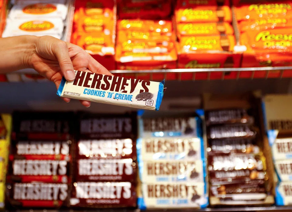 Big buyers, such as Hershey and Mondelez, buy and sell cocoa on global exchanges, where they trade physical beans as well as futures contracts that can require them to take a delivery of beans at a future date.