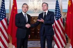 Chinese Foreign Minister Wang Yi (left) and US Secretary of State Antony Blinken in Washington, DC, on Oct 26.  The US and China share a common interest in defusing the crisis in the Middle East, says the writer.
