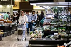 The campaign pledge, to be announced on Friday, will include a proposal to offer cash payouts to cushion the blow to households from rising living costs, the paper said.