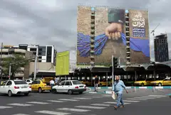 A billboard in Teheran, seen on Apr 19, describes the Strait of Hormuz as “forever in Iran’s hand”.