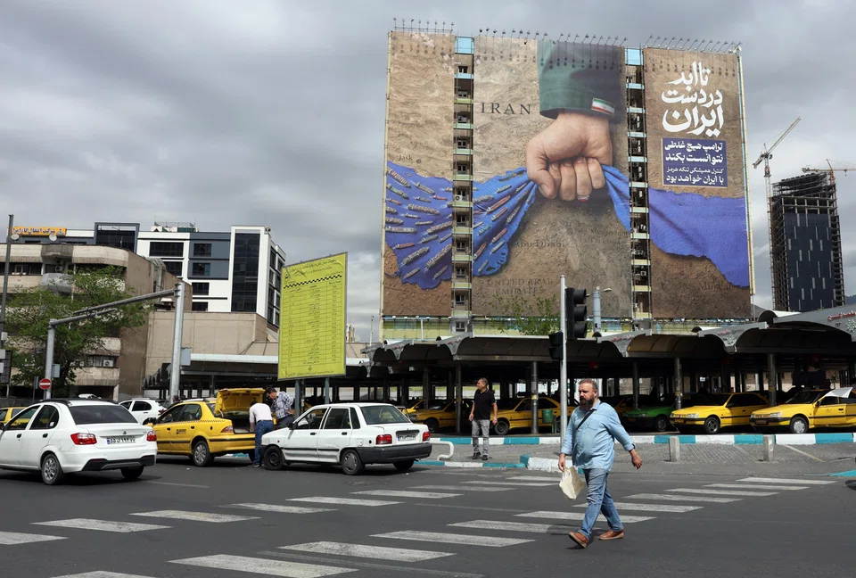A billboard in Teheran, seen on Apr 19, describes the Strait of Hormuz as “forever in Iran’s hand”.