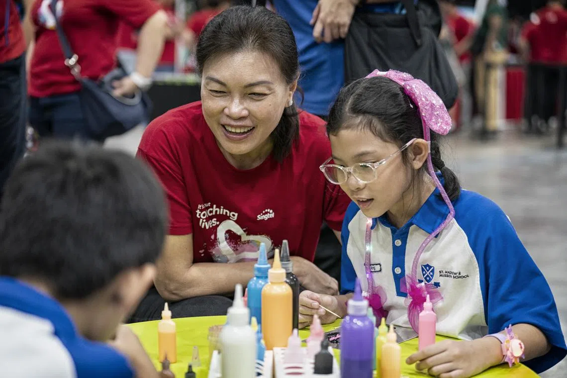 Singtel's group chief people and sustainability officer Aileen Tan says that the carnival also helps employees understand vulnerable communities better. 