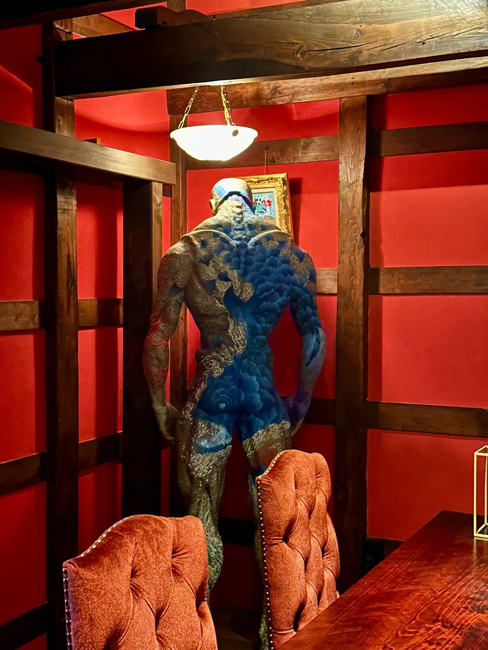 A speakeasy bourbon bar features bold styrofoam sculptures by a Japanese artist.