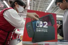 A customers purchases a Nintendo Switch 2 at an electronics retailer in Tokyo, Japan, June 5, 2025. 