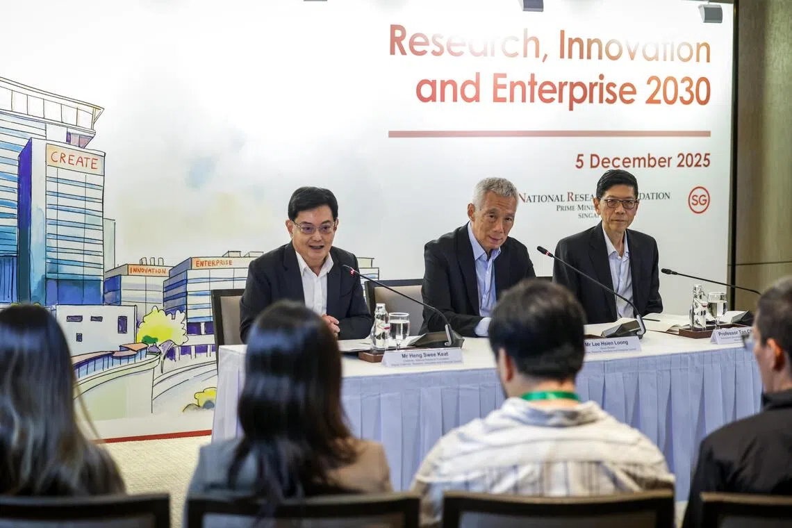 Senior Minister and Chair of the RIE Council Lee Hsien Loong (C) said Singapore can play a role as a “semiconductor centre”, given its skilled, disciplined workforce and a stable economic and political environment. Seen beside him are  Heng Swee Keat (L), Chairman of the National Research Foundation (NRF) and Professor Tan Chorh Chuan, Permanent Secretary (National Research and Development).  
