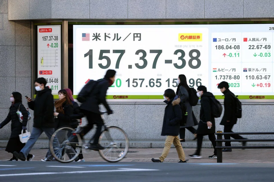 The rate of the yen against the US dollar displayed outside a securities firm in Tokyo, Japan, Feb 9, 2026. 