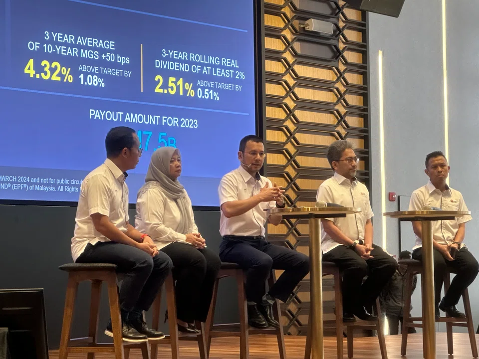 Malaysia Employees Provident Fund (EPF) CEO Ahmad Zulqarnain Onn (centre) says: “Foreign markets, especially the United States, were performing strong last year, mainly driven by the outperforming tech stocks in the S&P 500 index. This has generated higher returns to EPF."