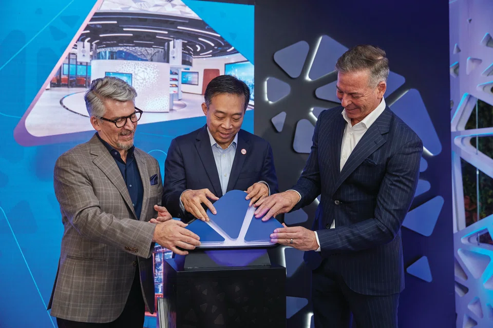 From left: Jack Forestell, Visa’s Chief Product & Strategy Officer; Png Cheong Boon, Chairman, Singapore Economic Development Board; and Stephen Karpin, Regional President for Visa Asia Pacific at the grand reopening of Visa’s Innovation Centre in Singapore.