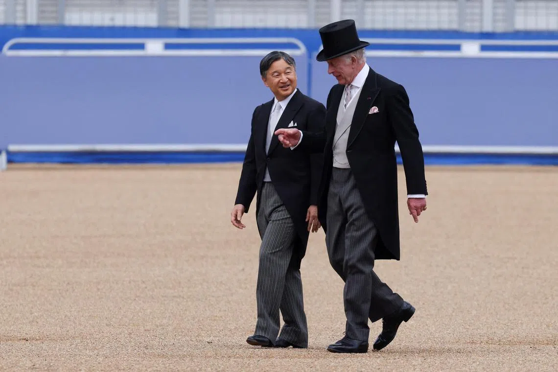Japan's Emperor Naruhito and Britain's King Charles after inspecting the Guard of Honour formed by the 1st Battalion Welsh Guards during a state visit in London.
