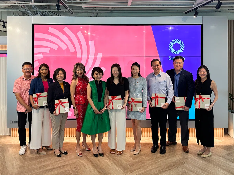 Pearlyn Phau (centre, in green), group chief executive of Singlife, says that more than half of those over 65 will likely need some form of long-term care in their lifetime.