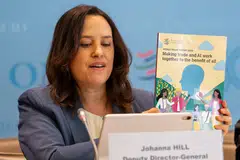 WTO deputy director-general Johanna Hill speaking at a media conference, where she said trends such as AI are reshaping the global economy and international trade.