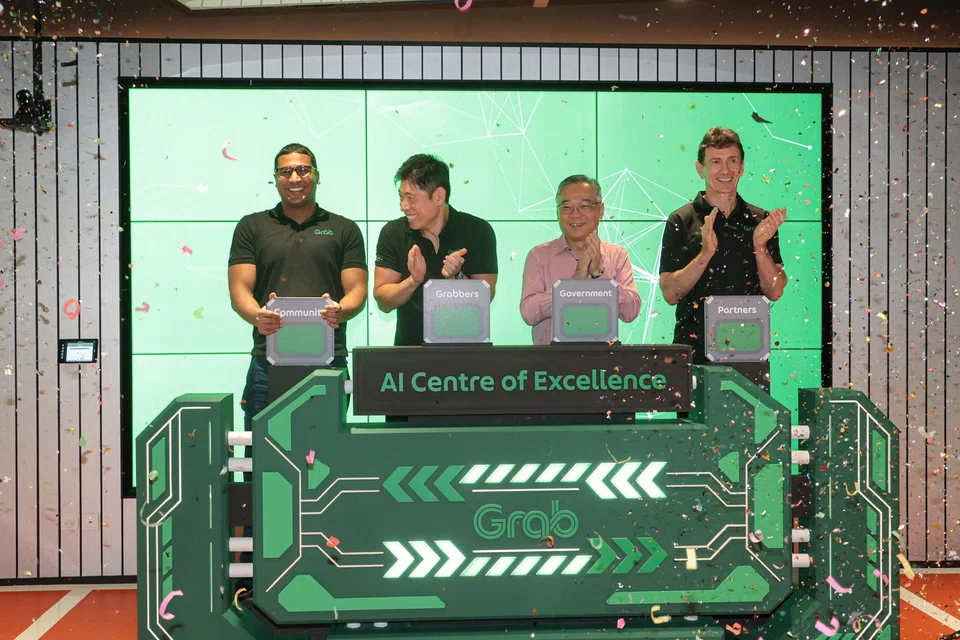 From left: Grab chief technology officer Suthen Thomas; Grab CEO Anthony Tan; DPM Gan Kim Yong; Grab chief operating officer Alex Hungate at launch of Grab's AI Centre of Excellence.