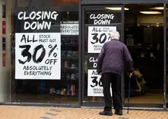 Closing-down signs at a shop in Huddersfield, UK. A study by the Centre of Economic Reform suggests that UK gross domestic product is 5.5 per cent lower than it would have been if Brexit had not happened.